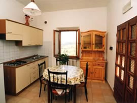 Номера и апартаменты в агротуристической усадьбе в Сан-Джиминьяно (Сиена) в Тоскане - Италия